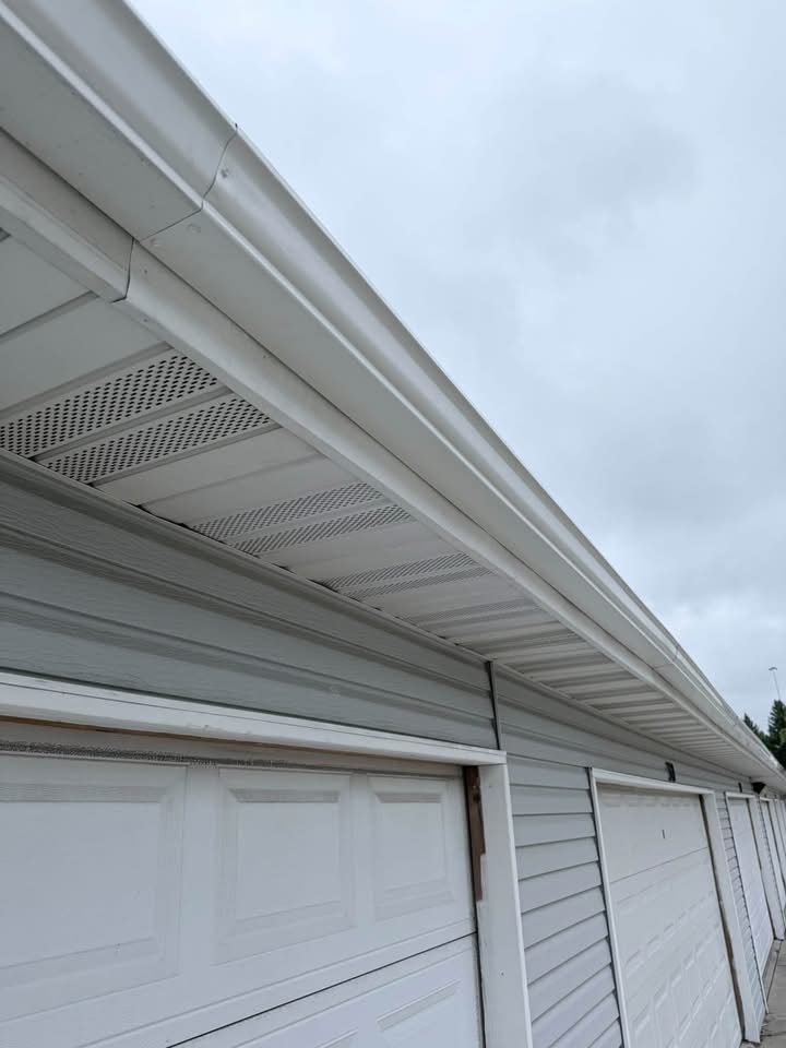 Completed, intact gutter and fascia along a garage roofline
